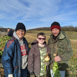 SoSA volunteers pose for a picture after gleaning turnips.